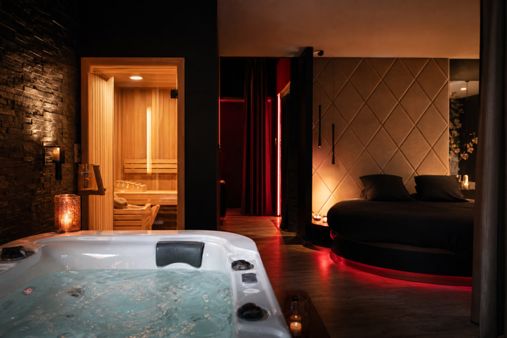 Illustration : Love room à Oignies avec jacuzzi privatif, sauna et pièce secrète